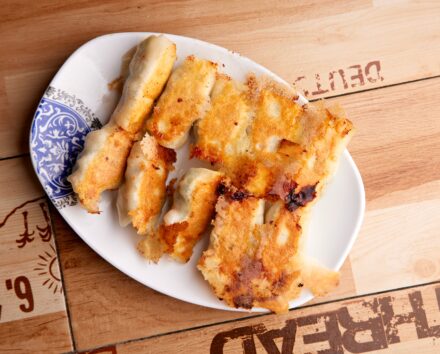 Golden Dumplings 2021.06.25 103A8101 1 1 440x354 - Pan-fried Chef Special Dumplings