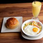Sunni Cafe Leg Ham and Macaroni Soup with Pineapple Bun and Fresh Orange Juice scaled